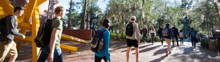 Students walking at UF campus