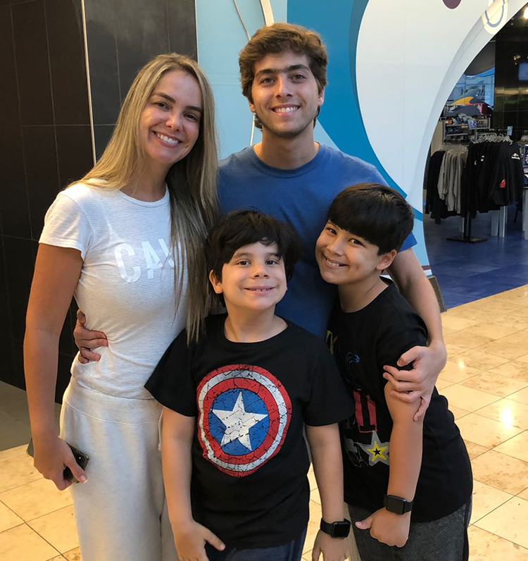 Ricardo's mom and siblings at the airport.